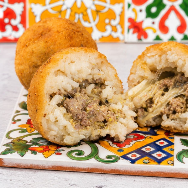 Arancini ai funghi con pistacchio e salsiccia - SicilyAddict