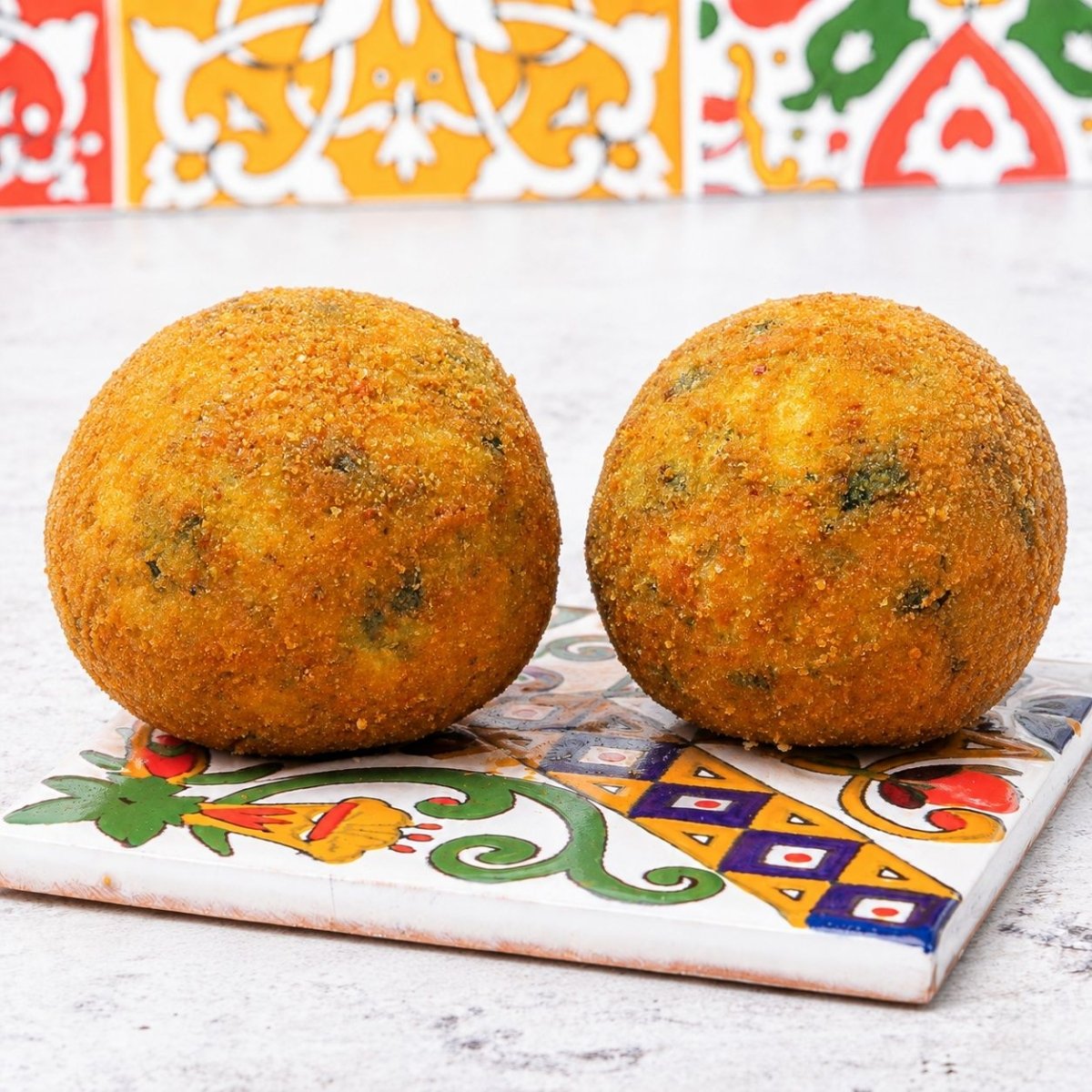 Arancini al ragù bianco con riso ai funghi e spinaci - SicilyAddict