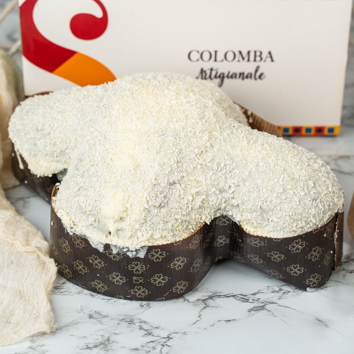 Colomba artigianale COCCOLONA 1,3kg extrafarcita con 500g di crema cocco - SicilyAddict