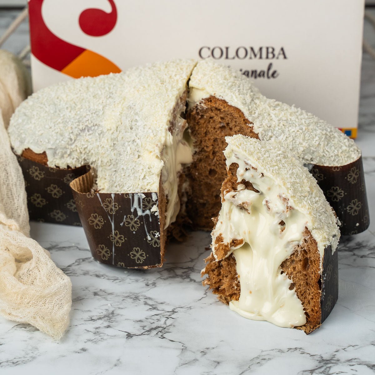 Colomba artigianale COCCOLONA 1,3kg extrafarcita con 500g di crema cocco - SicilyAddict