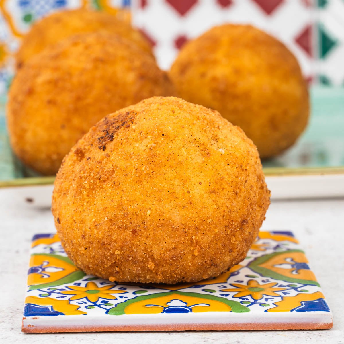Arancini al burro e prosciutto cotto - SicilyAddict