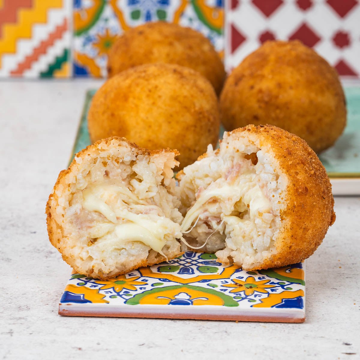 Arancini al burro e prosciutto cotto - SicilyAddict