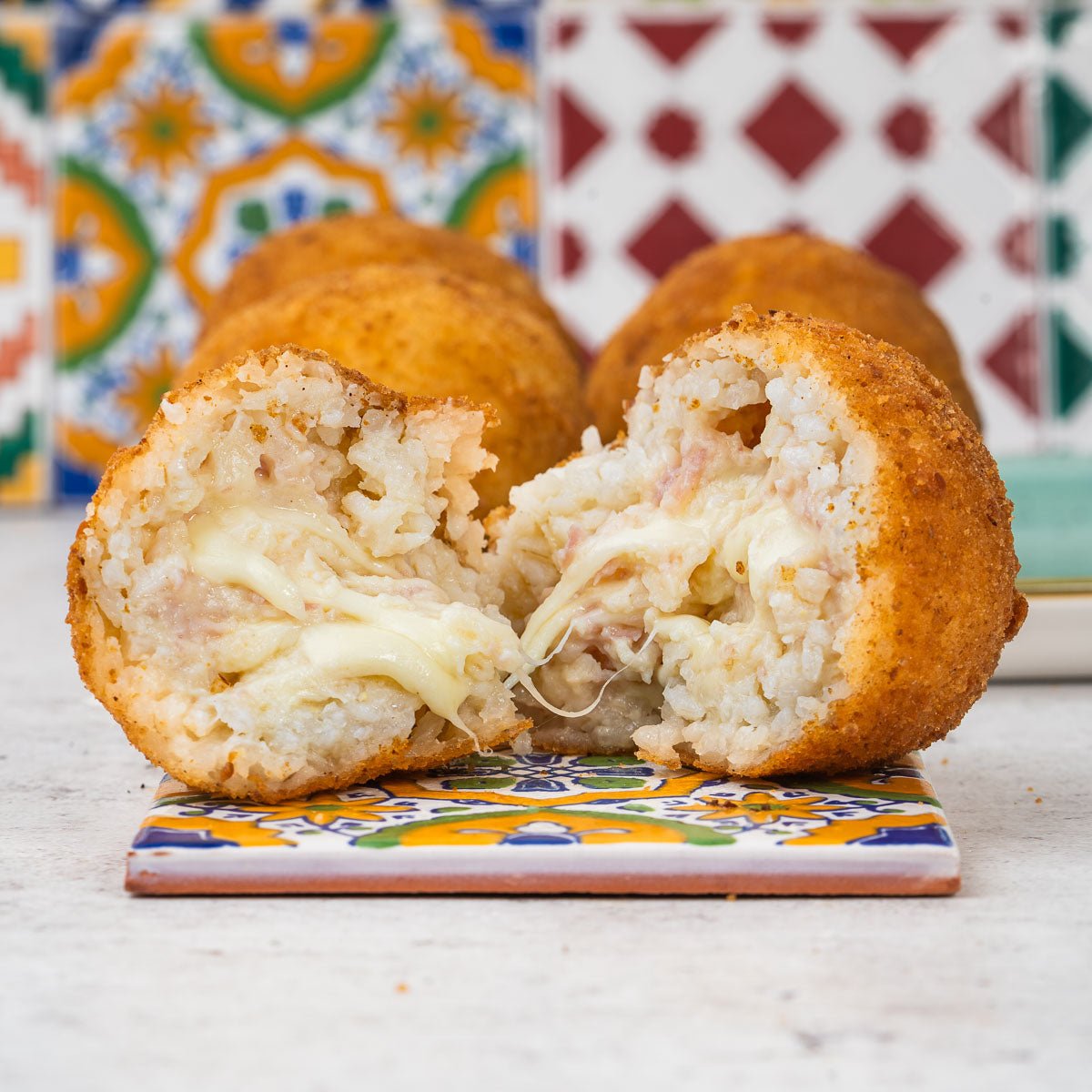 Arancini al burro e prosciutto cotto - SicilyAddict