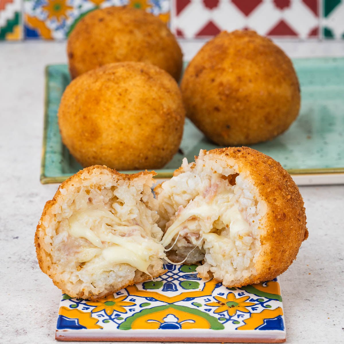 Arancini al burro e prosciutto cotto - SicilyAddict