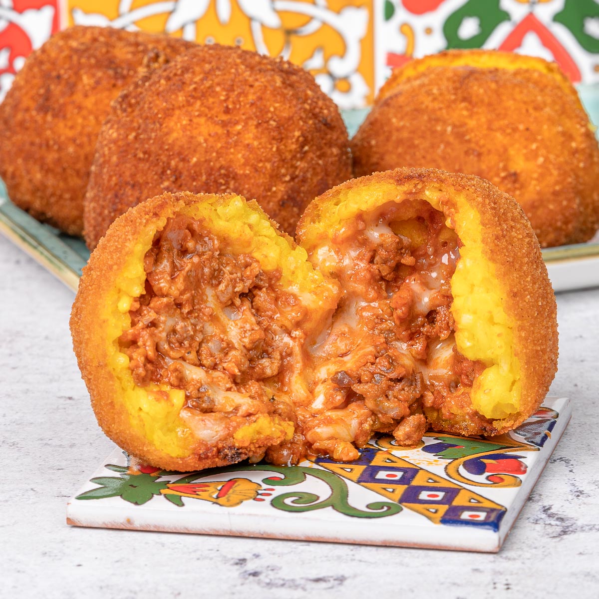 Arancini al ragu' di suino nero dei Nebrodi - SicilyAddict