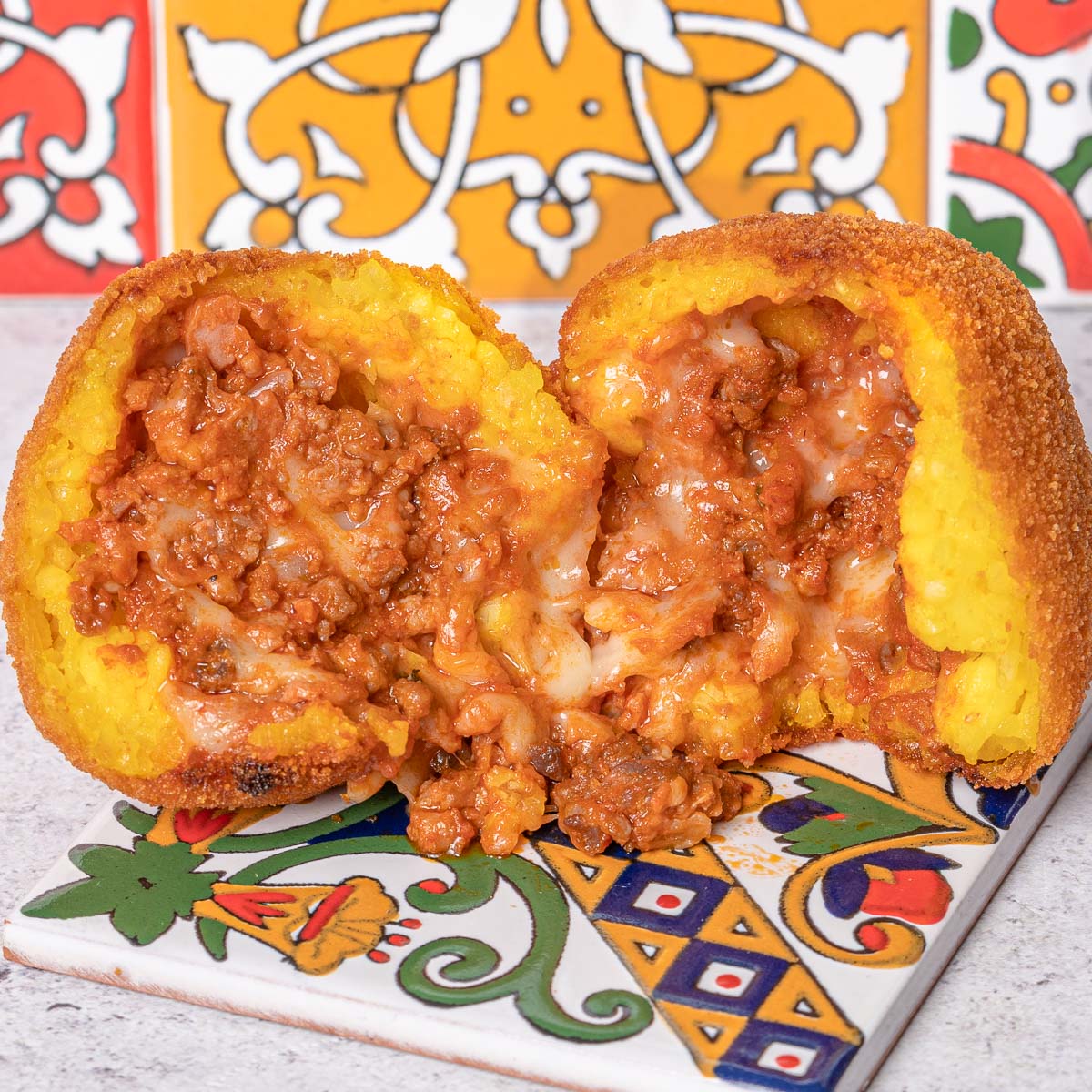 Arancini al ragu' di suino nero dei Nebrodi - SicilyAddict