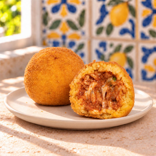Arancini al ragu' di suino nero dei Nebrodi – foto SicilyAddict