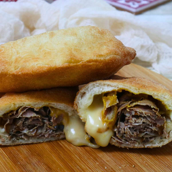 Pidone alla porchetta di suino nero dei Nebrodi e provola affumicata con crema di zucca 180g x 4 Pezzi