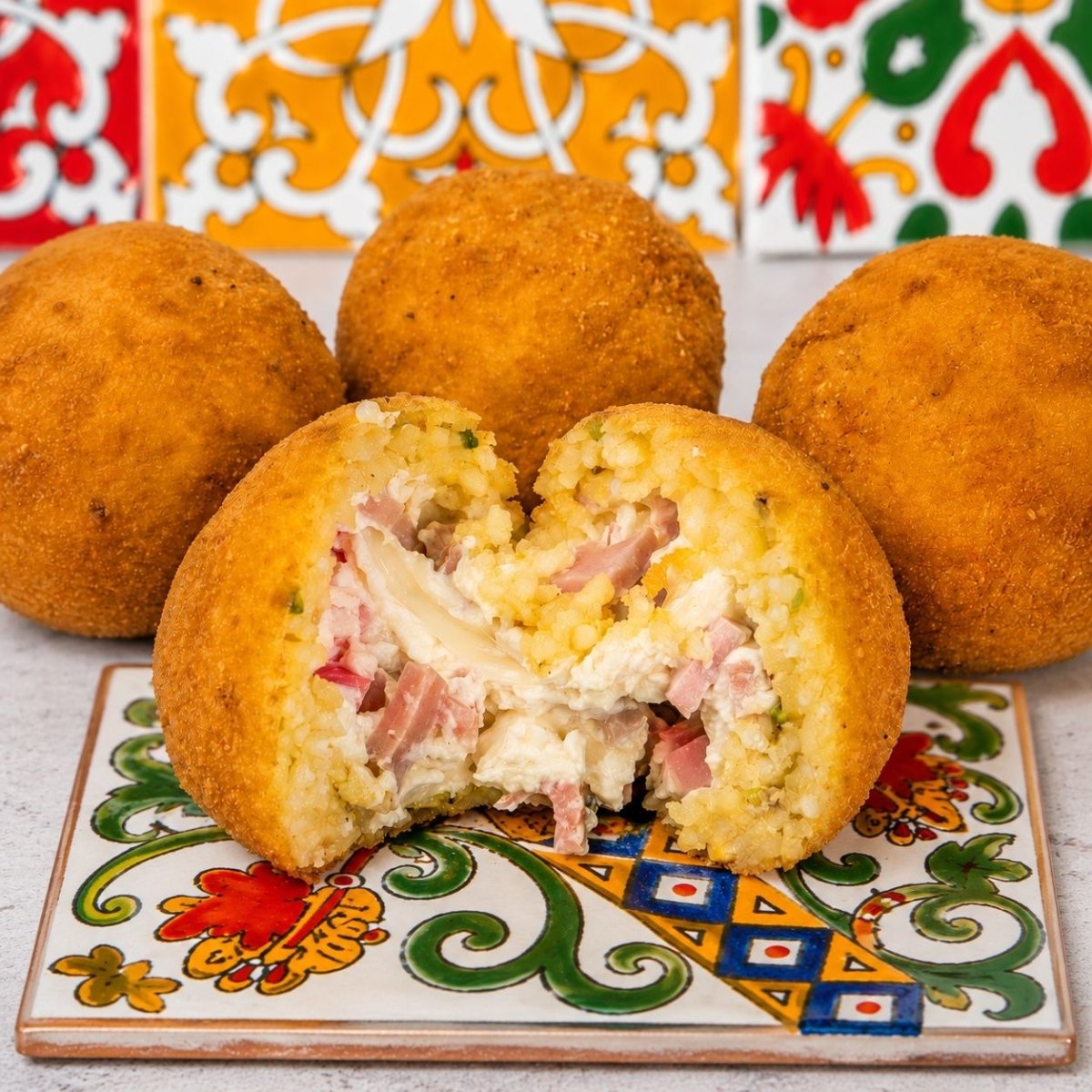 Arancini al limone con mortadella e formaggio fresco - SicilyAddict