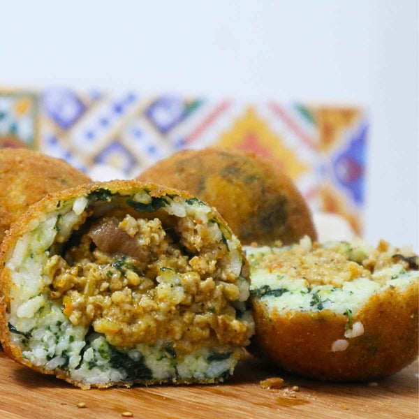 Arancini al ragù bianco con riso ai funghi e spinaci - SicilyAddict