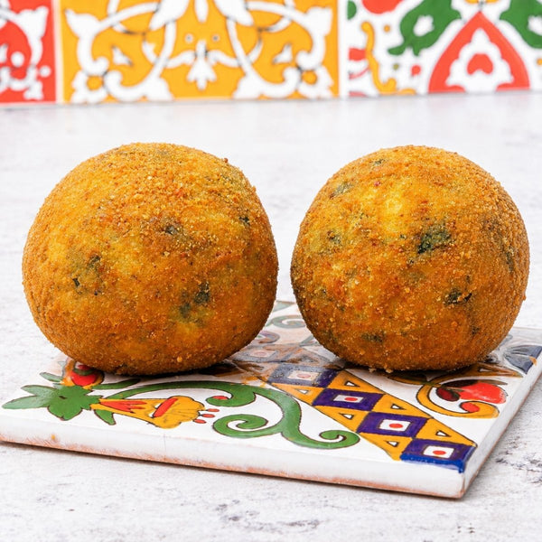 Arancini al ragù bianco con riso ai funghi e spinaci - SicilyAddict