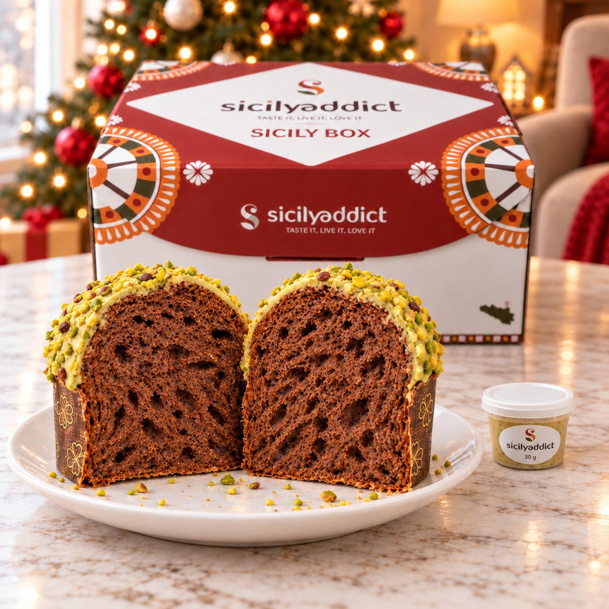 Box di 6 panettoncini assortiti con panettoncini tagliati per mostrare l’impasto.