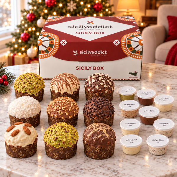 Box Luxury SicilyAddict da 9 panettoncini artigianali, vista frontale dell’assortimento.