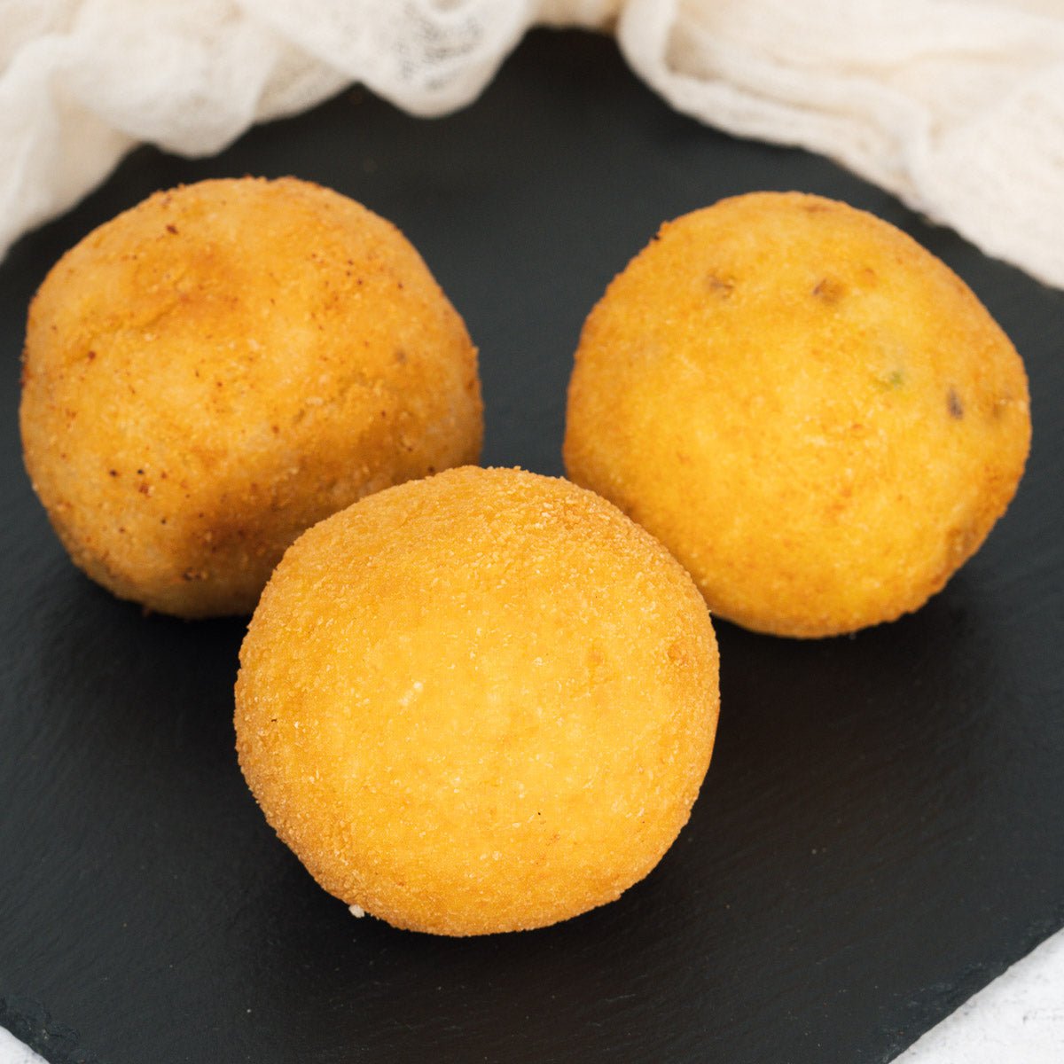 Arancini ai funghi con pistacchio e salsiccia - SicilyAddict
