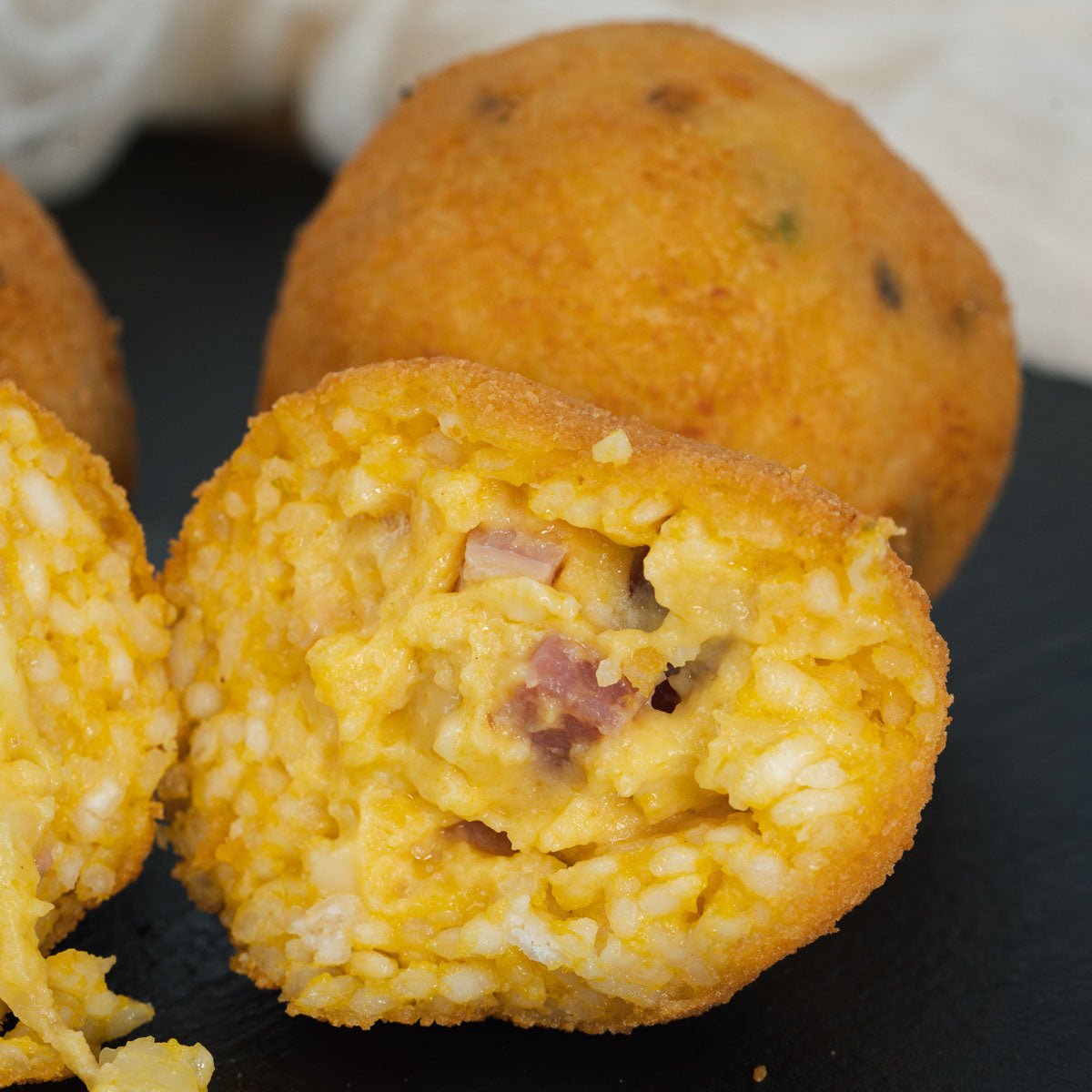 Arancini alla zucca con provola e speck - SicilyAddict